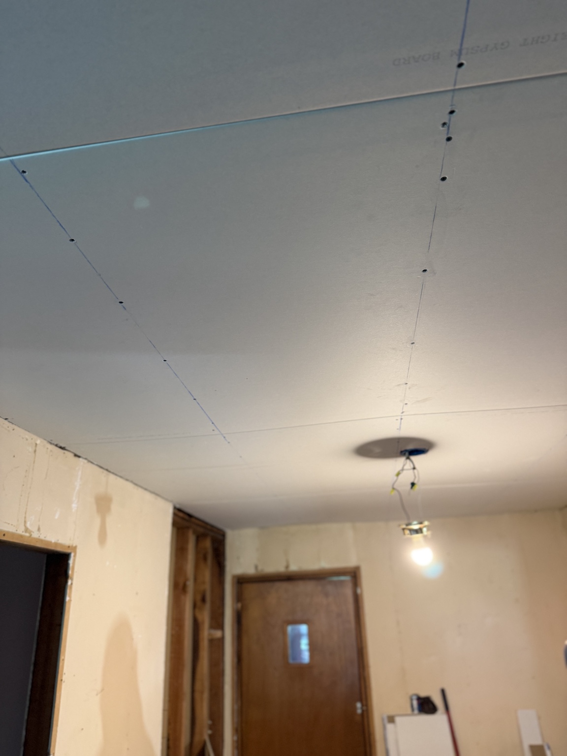New ceiling drywall during renovation